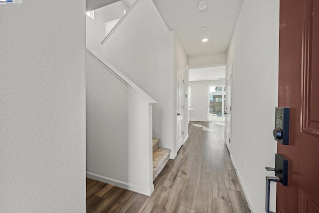 corridor featuring hardwood / wood-style flooring