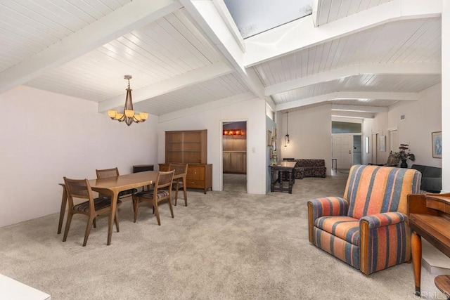 carpeted dining area featuring vaulted ceiling with beams and an inviting chandelier