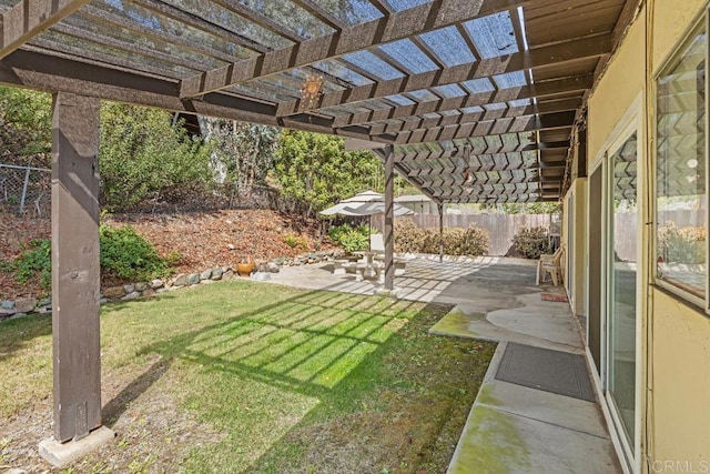 view of yard featuring a fenced backyard, a patio, and a pergola