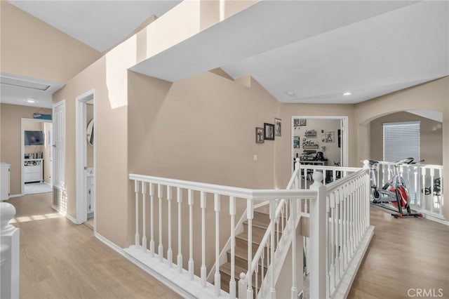 hallway with light hardwood / wood-style flooring