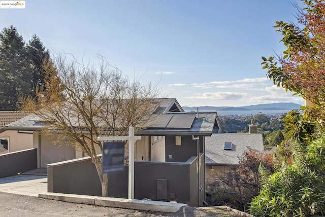 view of front of house with a mountain view