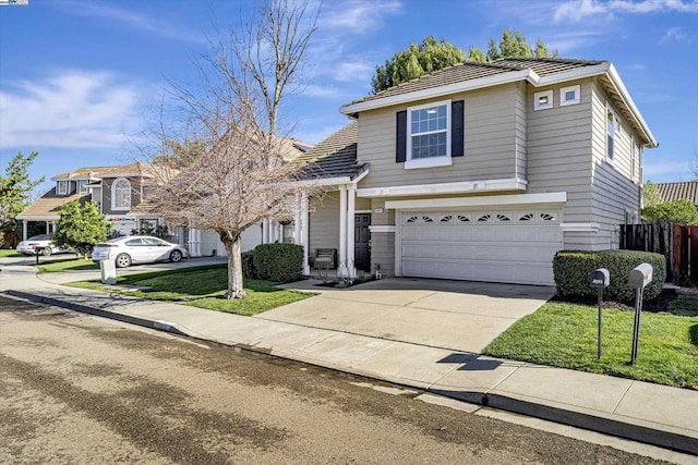 front facade featuring a garage and a front lawn