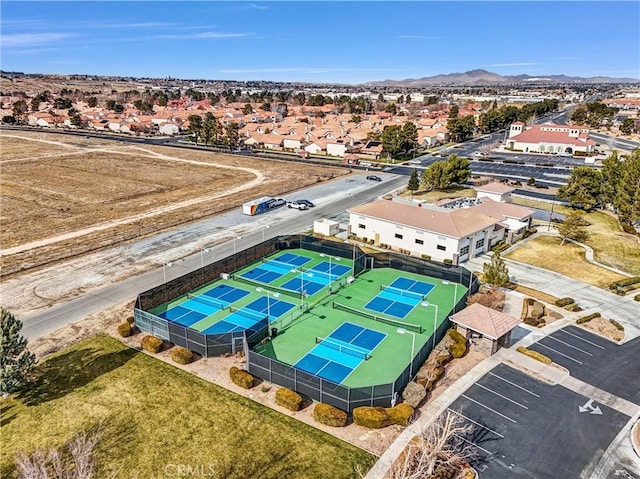 birds eye view of property featuring a mountain view