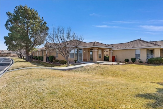 view of front of house with a front lawn