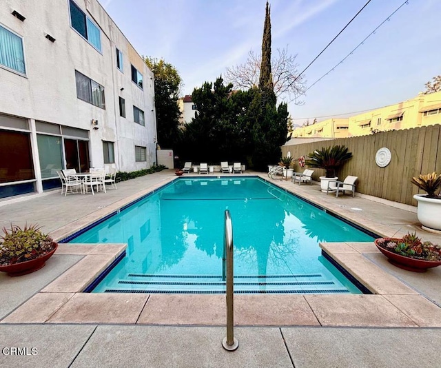 view of pool featuring a patio area