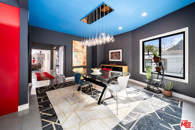 dining area with a notable chandelier