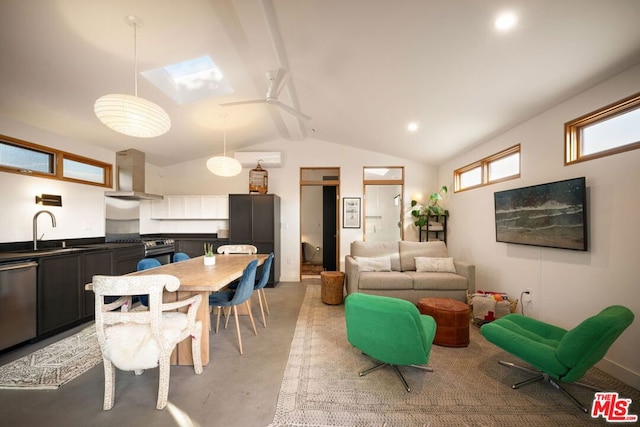 living room featuring lofted ceiling with beams and sink