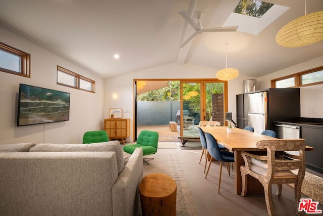 interior space featuring lofted ceiling with skylight and a healthy amount of sunlight