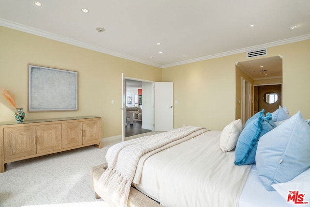 bedroom featuring light colored carpet and ornamental molding