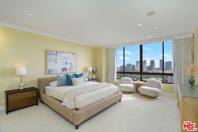 carpeted bedroom with crown molding