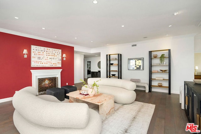 living room with ornamental molding and dark hardwood / wood-style flooring