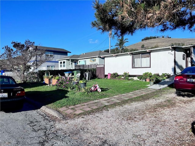 view of front of property with a front lawn