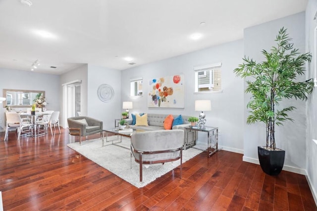 living room featuring dark hardwood / wood-style floors