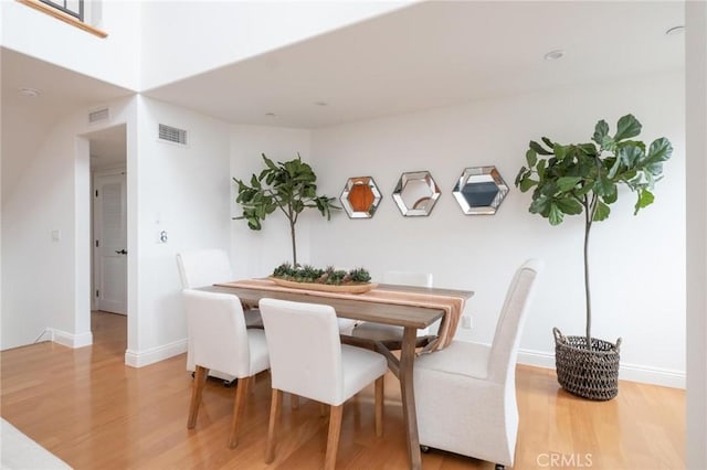 dining room featuring hardwood / wood-style floors