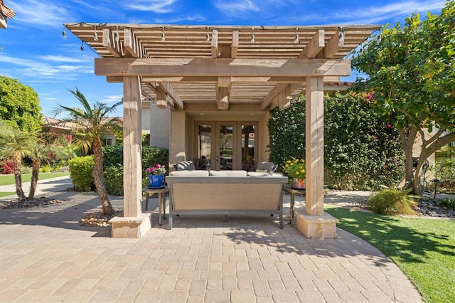 view of patio / terrace with outdoor lounge area, a pergola, and french doors