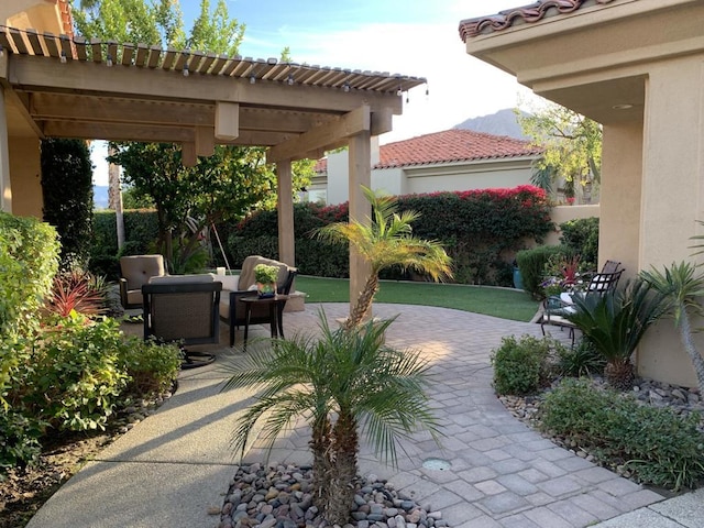 view of patio featuring a pergola