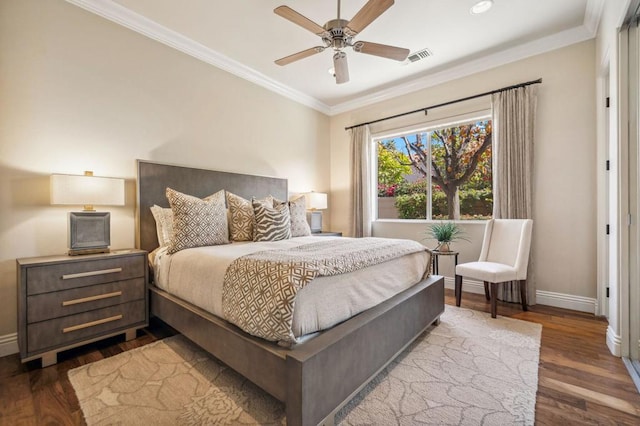 bedroom with ceiling fan, ornamental molding, and dark hardwood / wood-style flooring