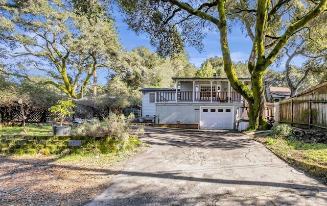 view of front of property with a garage