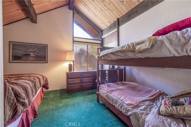 bedroom featuring vaulted ceiling with beams, dark carpet, and wooden ceiling