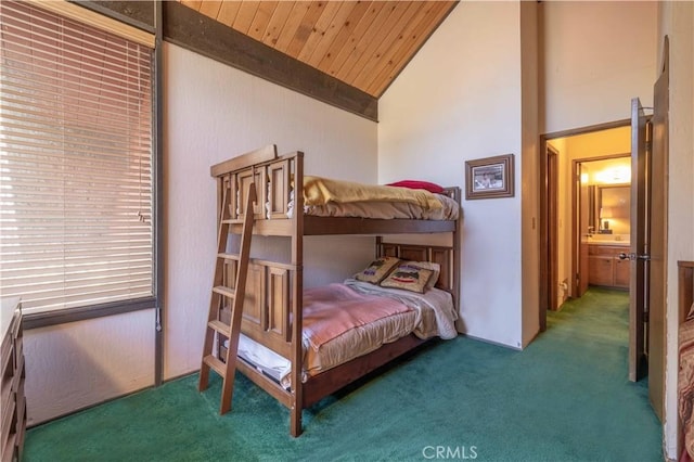 carpeted bedroom with high vaulted ceiling and wooden ceiling