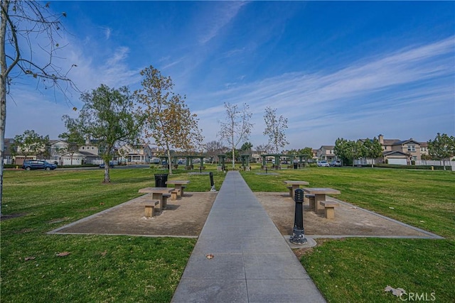 view of home's community featuring a yard