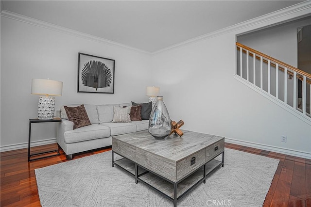 living room with crown molding and dark wood-type flooring