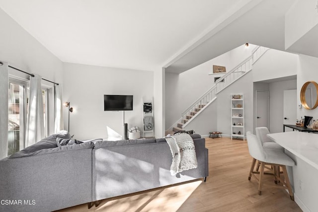 living room with light hardwood / wood-style flooring