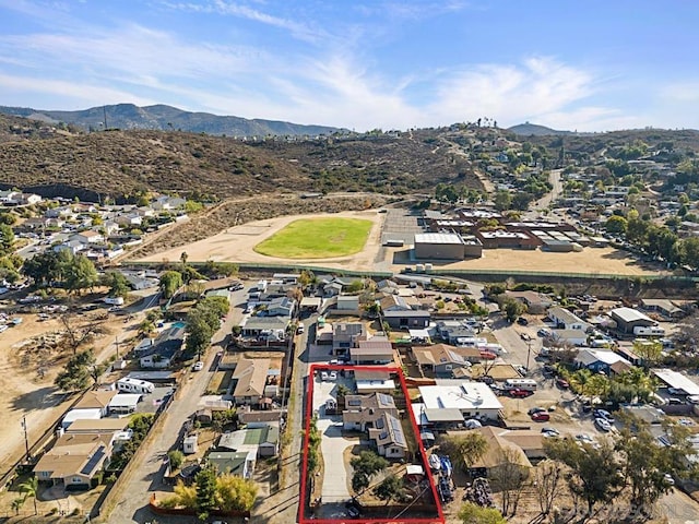 drone / aerial view featuring a mountain view