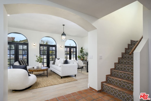 living room featuring hardwood / wood-style floors and french doors