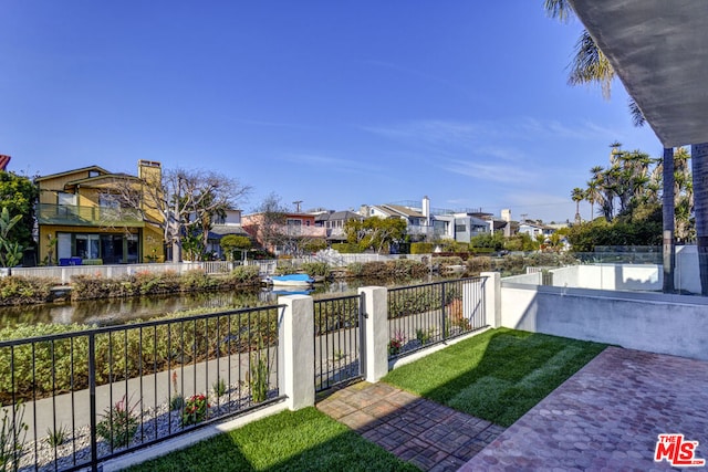 view of yard with a water view