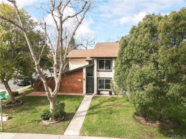 view of front of house with a front yard