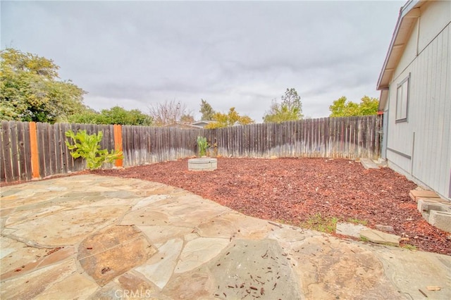 view of yard with a patio area