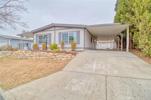 view of front of house with a carport