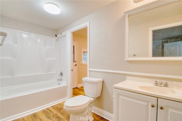 full bathroom featuring vanity, toilet, shower / bath combination, and wood-type flooring