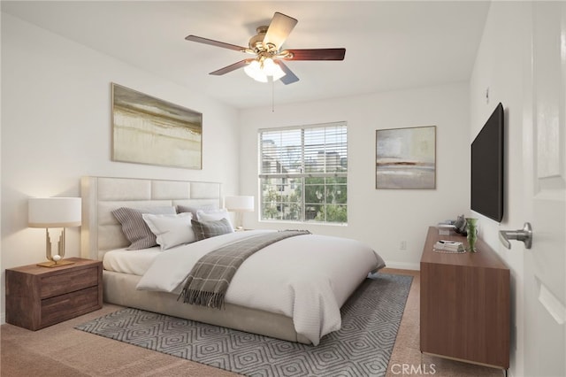 carpeted bedroom featuring a ceiling fan