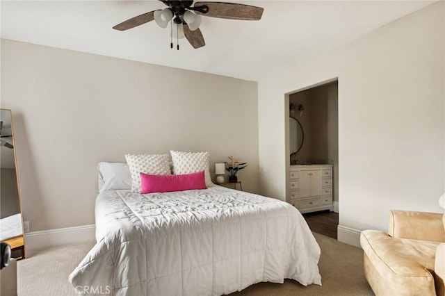 carpeted bedroom featuring ceiling fan and connected bathroom