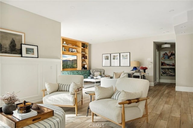 sitting room with light hardwood / wood-style floors