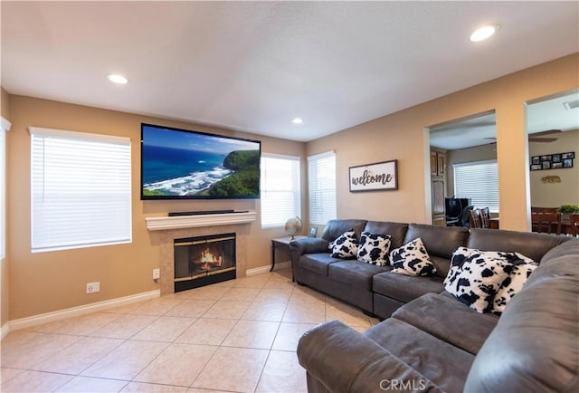 tiled living room featuring a fireplace