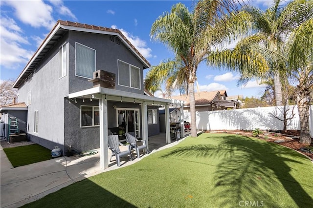 back of house featuring a patio