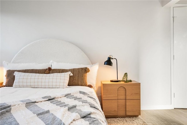 bedroom featuring light wood finished floors