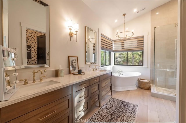 full bath featuring a shower stall, visible vents, and a sink