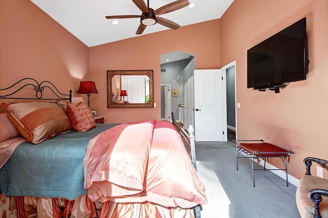 carpeted bedroom featuring lofted ceiling and ceiling fan