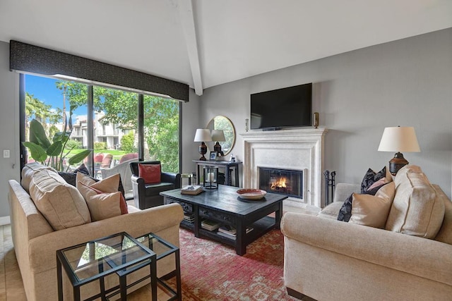 living room featuring lofted ceiling with beams