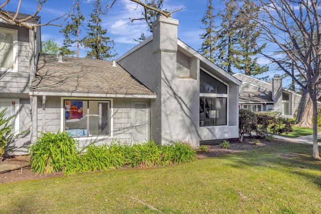 view of home's exterior featuring a yard