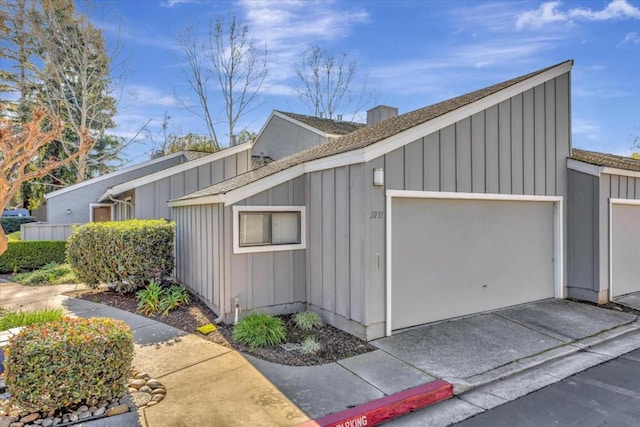 view of property exterior featuring a garage