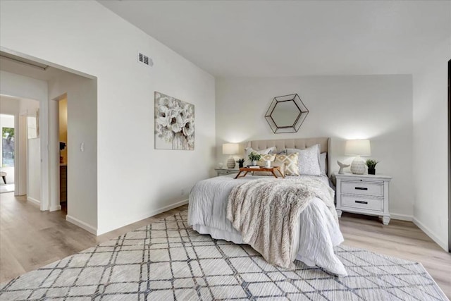 bedroom featuring light wood-type flooring