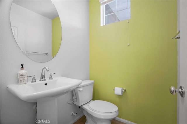 bathroom with sink and toilet