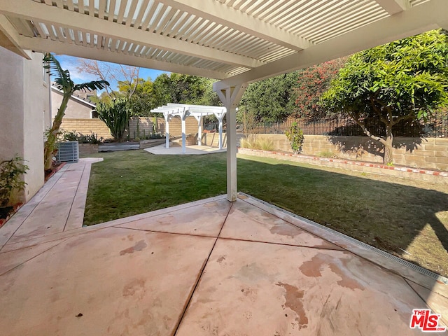 view of patio / terrace featuring a pergola and central AC