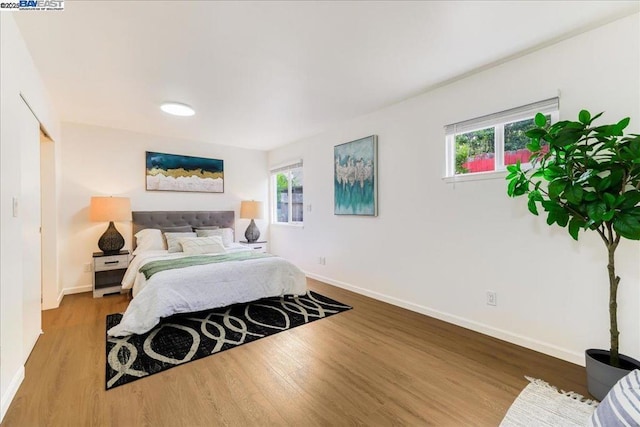 bedroom featuring hardwood / wood-style floors