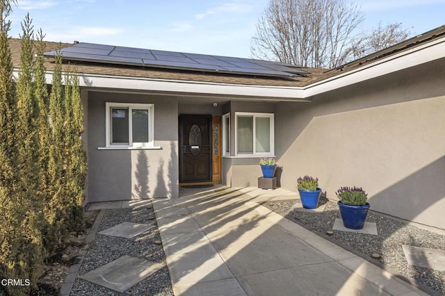 entrance to property with solar panels